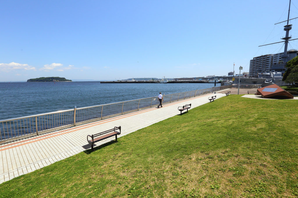 Scenic view of Mikasa Park in Yokosuka, overlooking Tokyo Bay. This historic park, one of the main venues for the Yokosuka Kaikoku Fireworks Festival, offers stunning waterfront views and is known for the Battleship Mikasa.